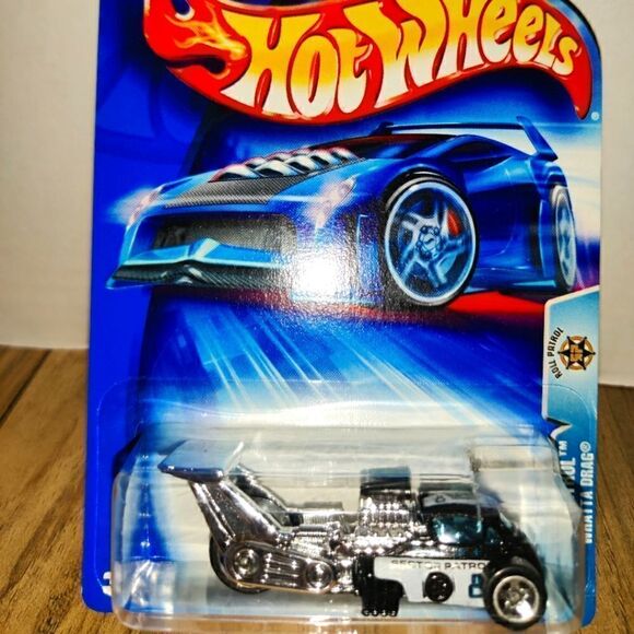2004 Hot Wheels Roll Patrol Whatta Drag Police Die-cast Car New #163 - Picture 4 of 4